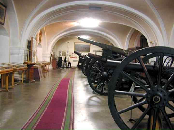 There are large displays of weaponry and ammunition, firearms and side-arms, military trophies, standards,