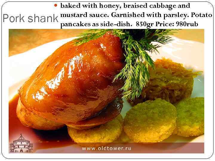  baked with honey, braised cabbage and Pork mustard sauce. Garnished with parsley. Potato