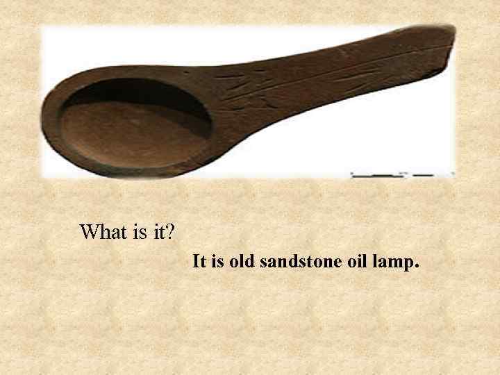 What is it? It is old sandstone oil lamp. 