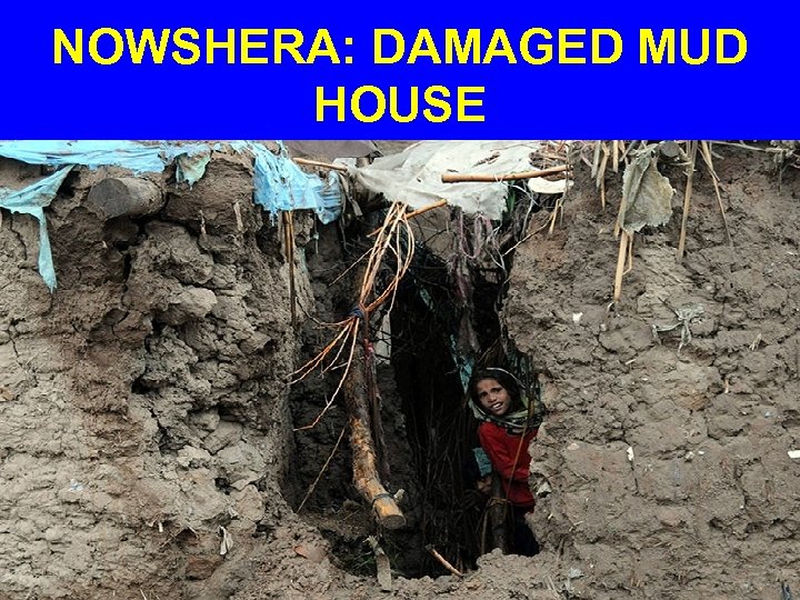 NOWSHERA: DAMAGED MUD HOUSE 