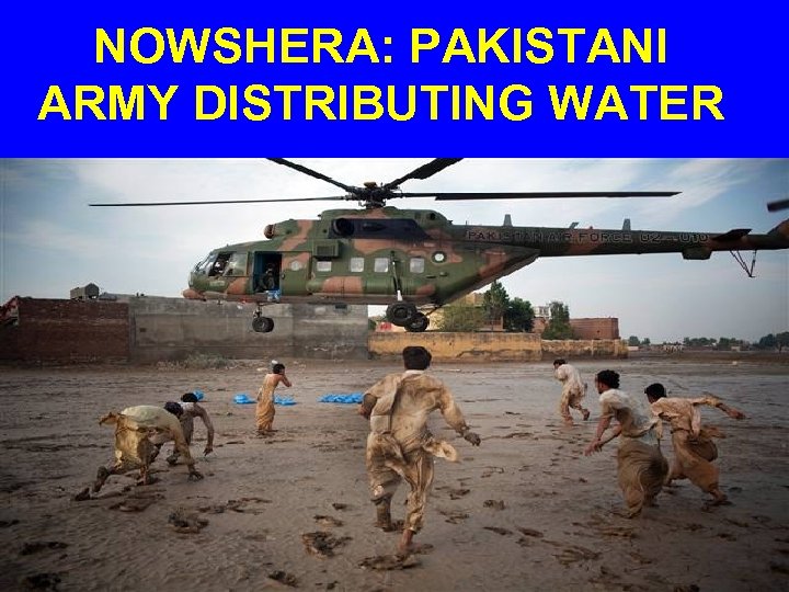 NOWSHERA: PAKISTANI ARMY DISTRIBUTING WATER 