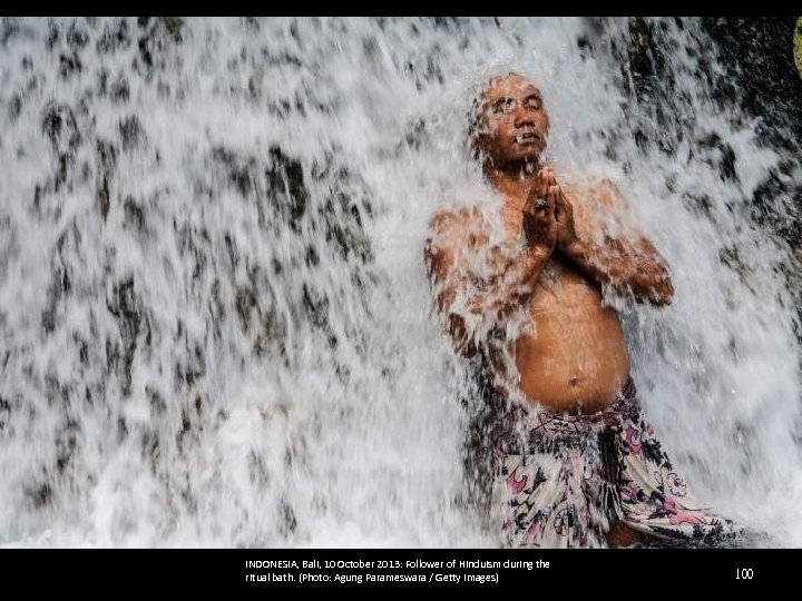 INDONESIA, Bali, 10 October 2013: Follower of Hinduism during the ritual bath. (Photo: Agung