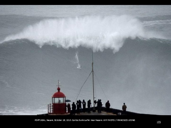 PORTUGAL, Nazare, October 28, 2013: Carlos Burle surfer near Nazare. AFP PHOTO / FRANCISCO