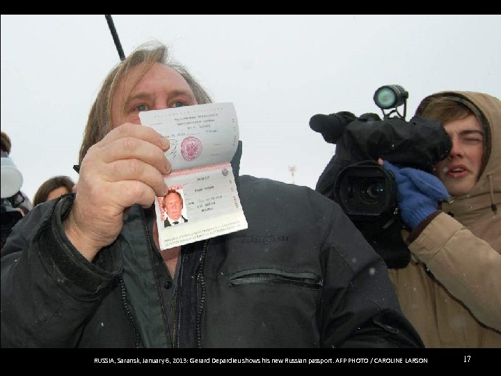 RUSSIA, Saransk, January 6, 2013: Gerard Depardieu shows his new Russian passport. AFP PHOTO