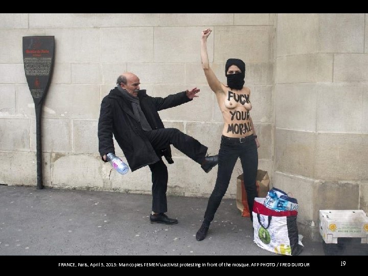  FRANCE, Paris, April 3, 2013: Man copies FEMEN'u activist protesting in front of