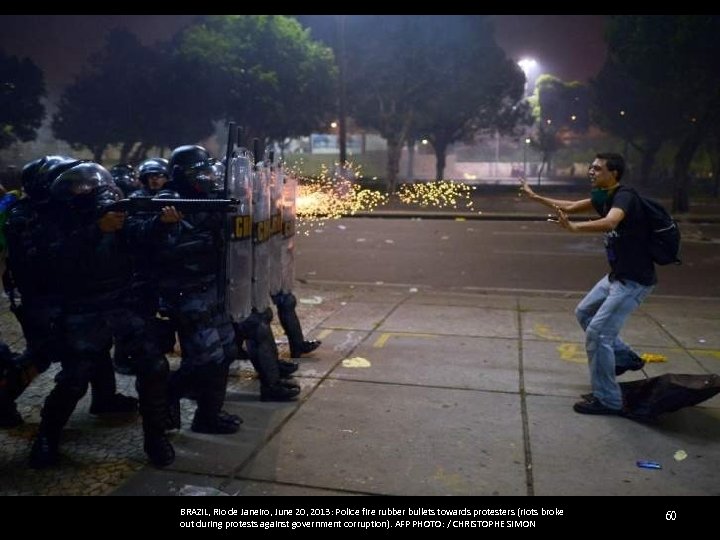 BRAZIL, Rio de Janeiro, June 20, 2013: Police fire rubber bullets towards protesters (riots