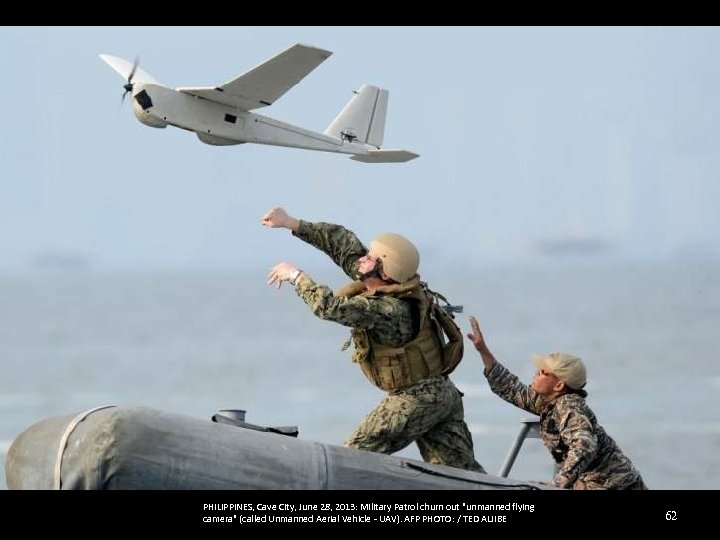PHILIPPINES, Cave City, June 28, 2013: Military Patrol churn out "unmanned flying camera" (called