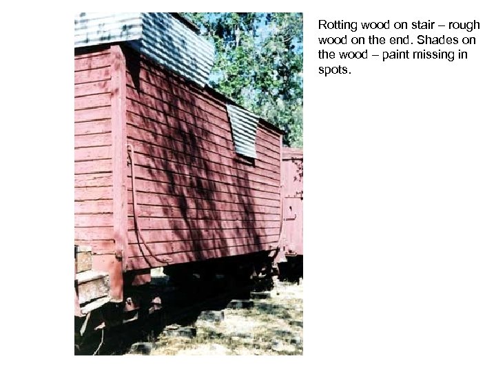 Rotting wood on stair – rough wood on the end. Shades on the wood