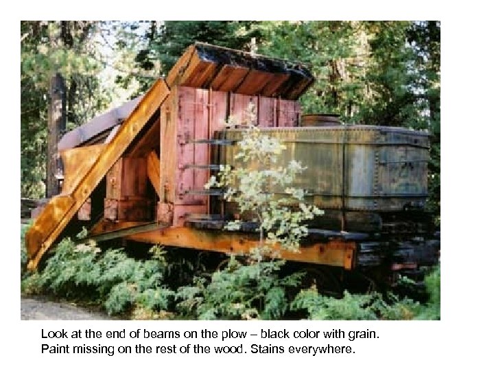Look at the end of beams on the plow – black color with grain.