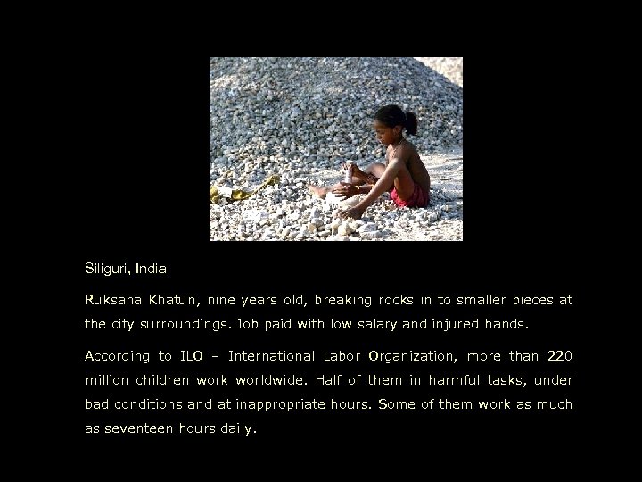 Siliguri, India Ruksana Khatun, nine years old, breaking rocks in to smaller pieces at