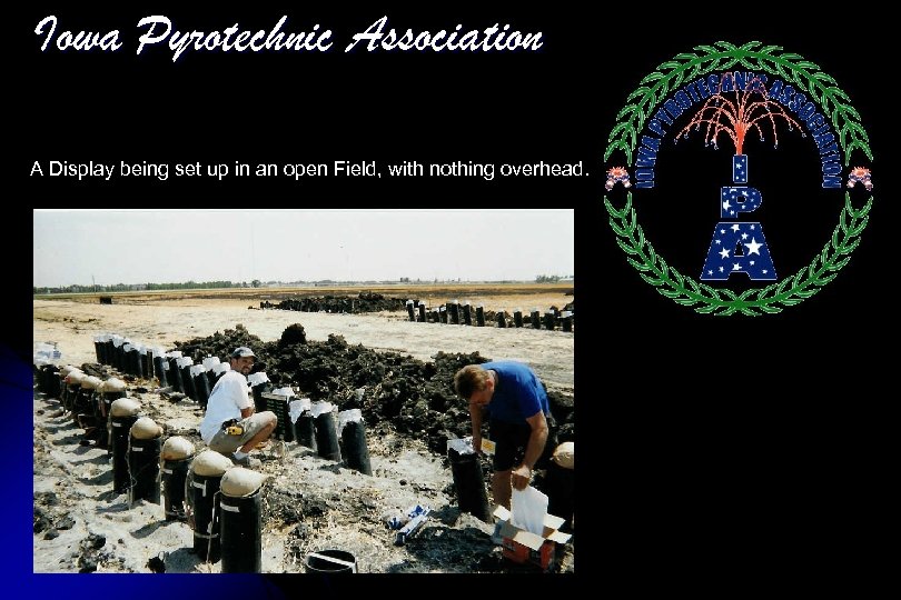 Iowa Pyrotechnic Association A Display being set up in an open Field, with nothing