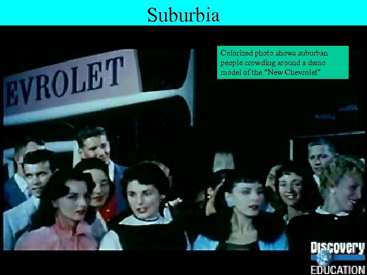 Suburbia Colorized photo shows suburban people crowding around a demo model of the “New
