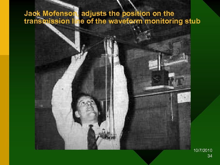 Jack Mofenson, adjusts the position on the transmission line of the waveform monitoring stub