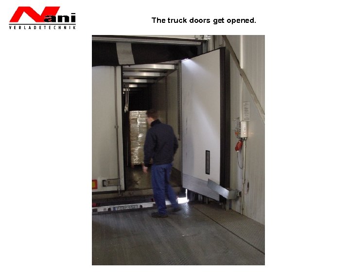 The truck doors get opened. 