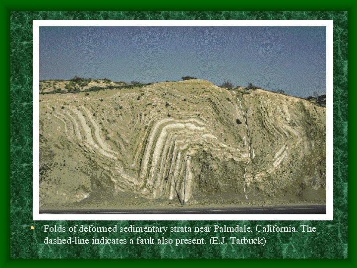  • Folds of deformed sedimentary strata near Palmdale, California. The dashed-line indicates a