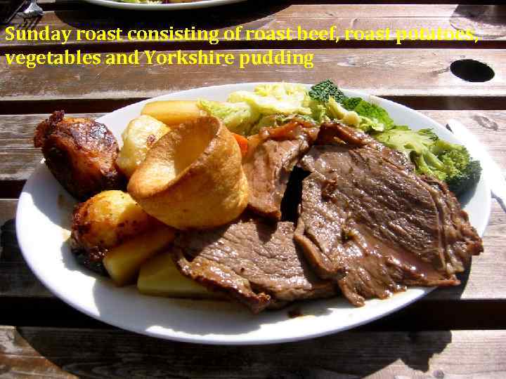 Sunday roast consisting of roast beef, roast potatoes, vegetables and Yorkshire pudding 