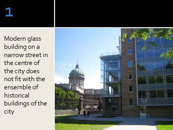 1 Modern glass building on a narrow street in the centre of the city