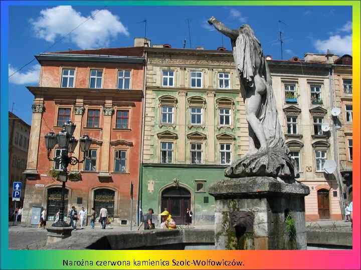 Narożna czerwona kamienica Szolc-Wolfowiczów. 