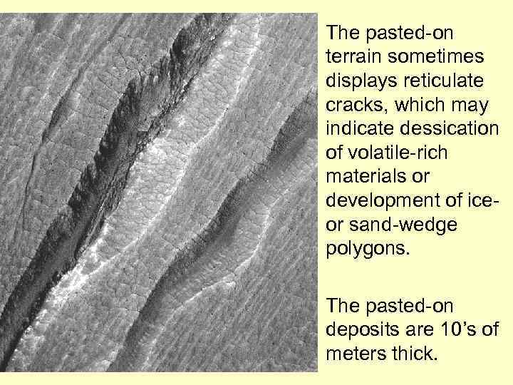 The pasted-on terrain sometimes displays reticulate cracks, which may indicate dessication of volatile-rich materials