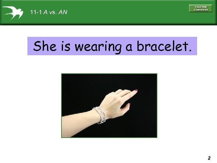 11 -1 A vs. AN She is wearing a bracelet. 2 