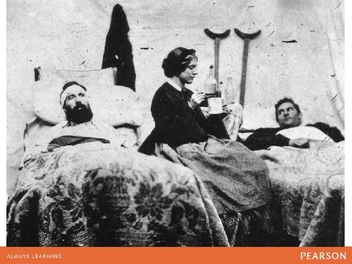 Nurse Ann Bell tending to wounded soldiers in a Union hospital. 