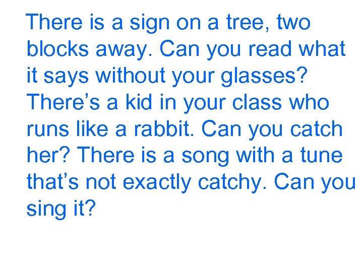 There is a sign on a tree, two blocks away. Can you read what