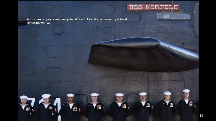 Sailors stand at parade rest during the USS Norfolk inactivation ceremony at Naval Station