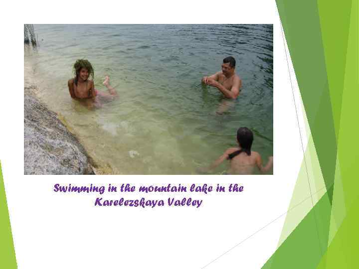 Swimming in the mountain lake in the Karelezskaya Valley 
