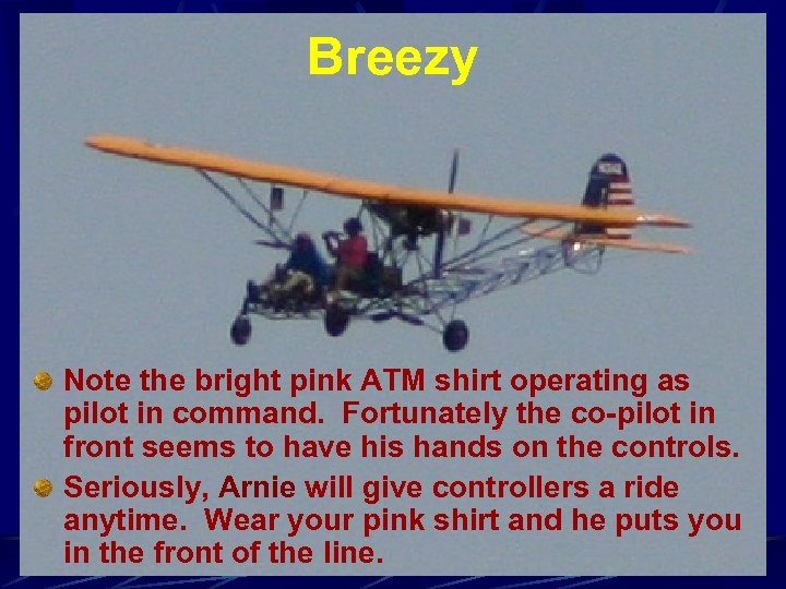 Breezy Note the bright pink ATM shirt operating as pilot in command. Fortunately the