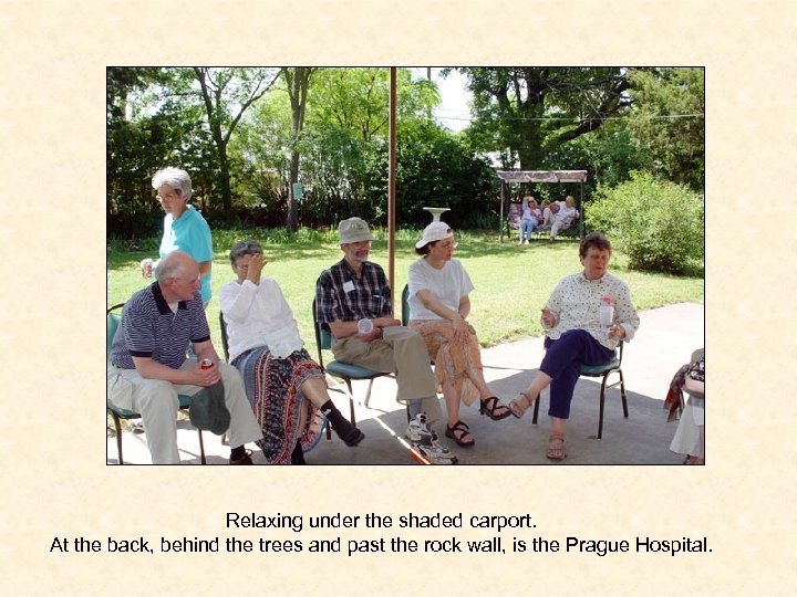 Relaxing under the shaded carport. At the back, behind the trees and past the