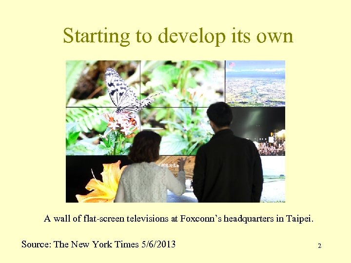 Starting to develop its own A wall of flat-screen televisions at Foxconn’s headquarters in