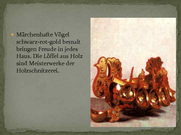  Märchenhafte Vögel schwarz-rot-gold bemalt bringen Freude in jedes Haus. Die Löffel aus Holz