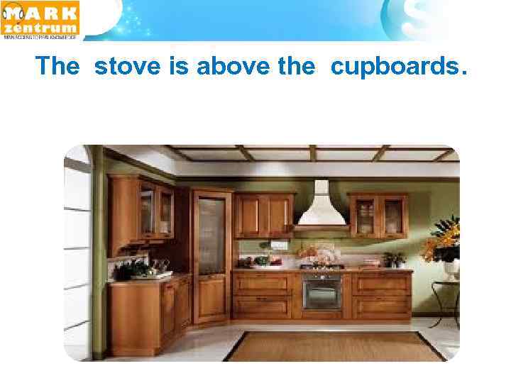  The stove is above the cupboards. 