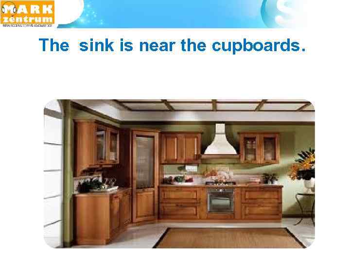  The sink is near the cupboards. 