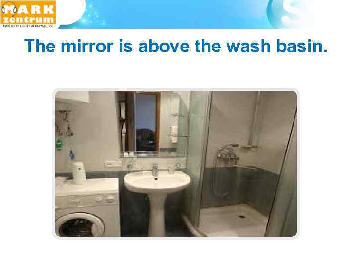  The mirror is above the wash basin. 