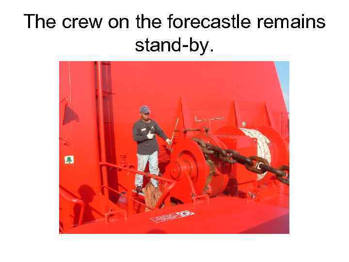 The crew on the forecastle remains stand-by. 