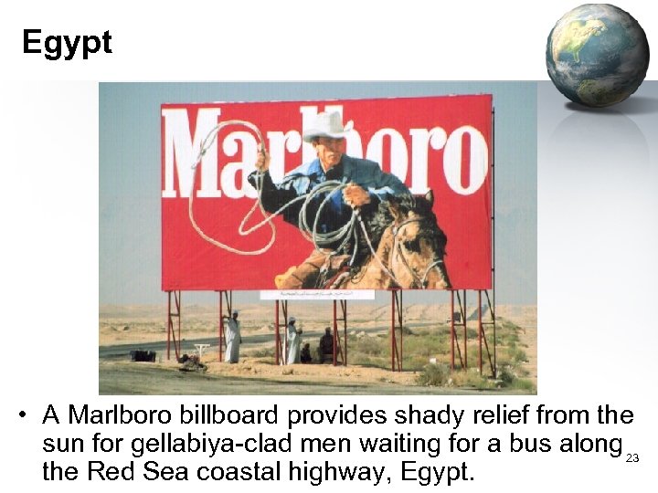 Egypt • A Marlboro billboard provides shady relief from the sun for gellabiya-clad men