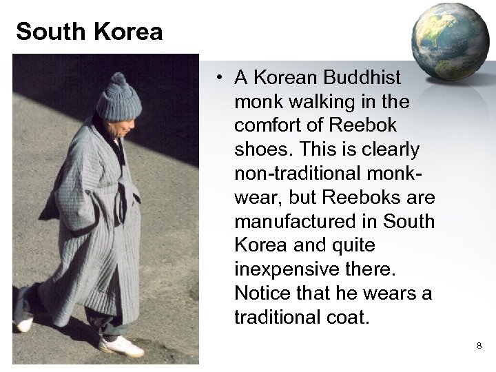 South Korea • A Korean Buddhist monk walking in the comfort of Reebok shoes.
