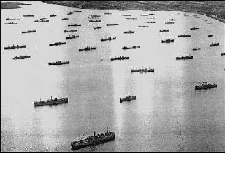 Aerial views of a convoy escorted by a battleship during the Battle of the