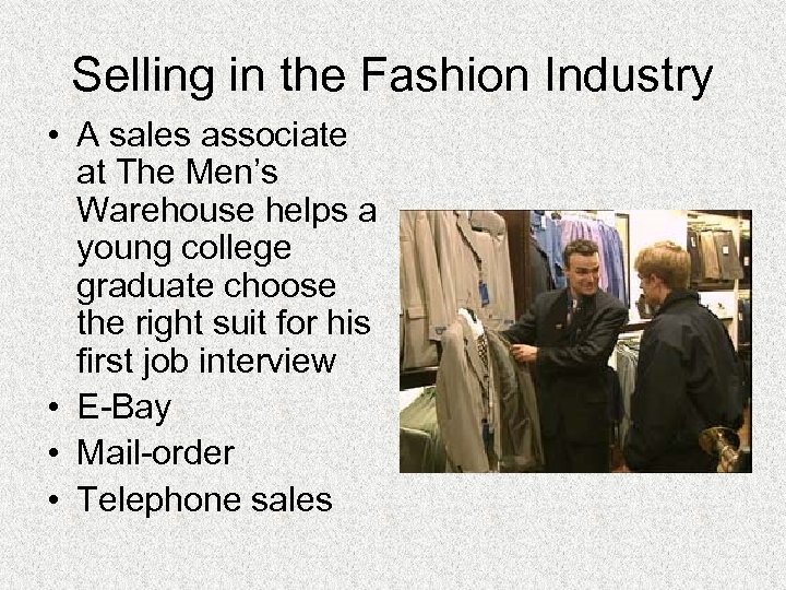 Selling in the Fashion Industry • A sales associate at The Men’s Warehouse helps