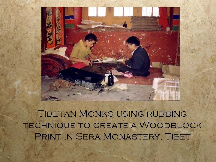 Tibetan Monks using rubbing technique to create a Woodblock Print in Sera Monastery, Tibet