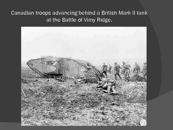 Canadian troops advancing behind a British Mark II tank at the Battle of Vimy