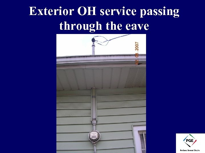 Exterior OH service passing through the eave 
