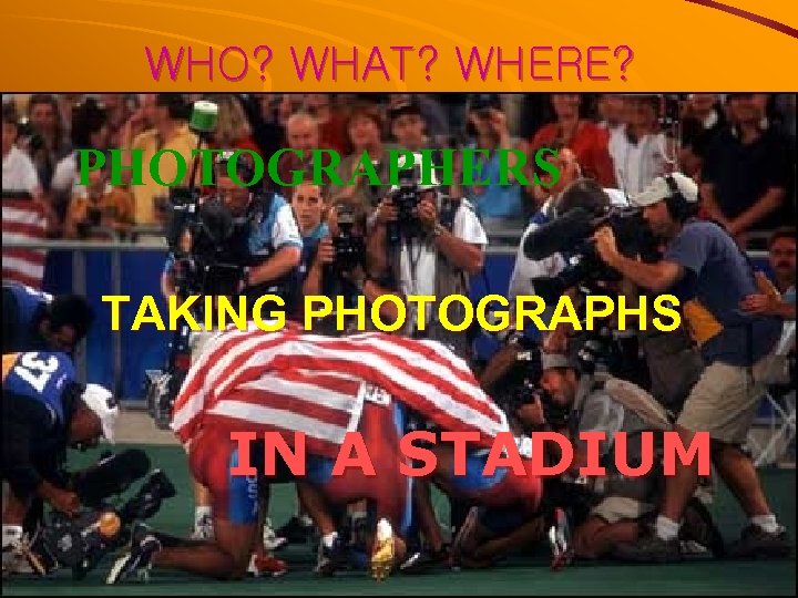 WHO? WHAT? WHERE? PHOTOGRAPHERS TAKING PHOTOGRAPHS IN A STADIUM 