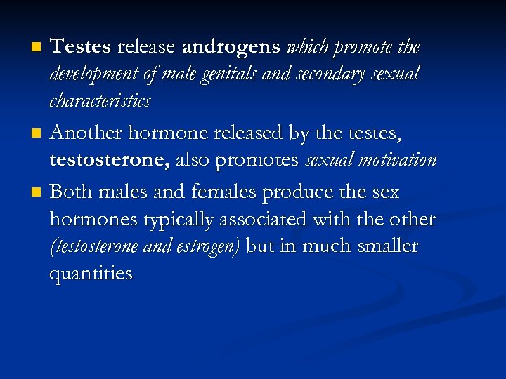 Testes release androgens which promote the development of male genitals and secondary sexual characteristics