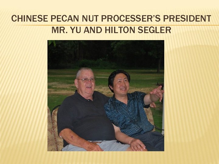 CHINESE PECAN NUT PROCESSER’S PRESIDENT MR. YU AND HILTON SEGLER 