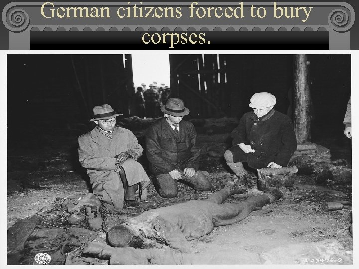 German citizens forced to bury corpses. 