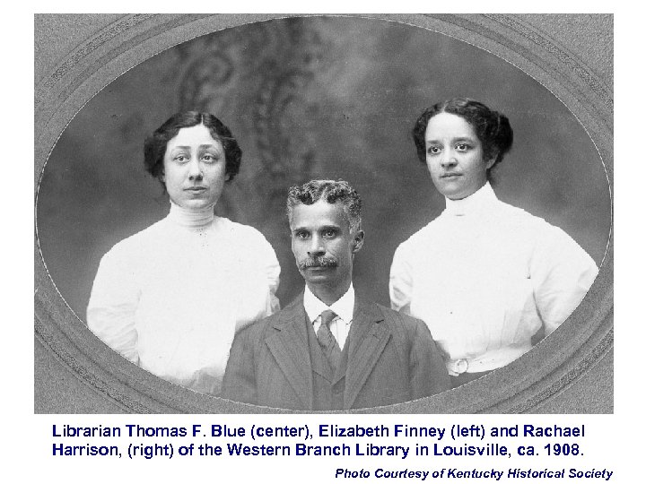 Librarian Thomas F. Blue (center), Elizabeth Finney (left) and Rachael Harrison, (right) of the