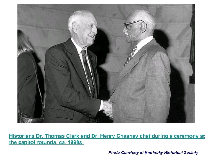 Historians Dr. Thomas Clark and Dr. Henry Cheaney chat during a ceremony at the
