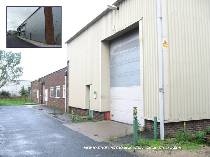 VIEW SOUTH OF UNIT C LOOKING WEST ALONG SOUTH ELEVATION 